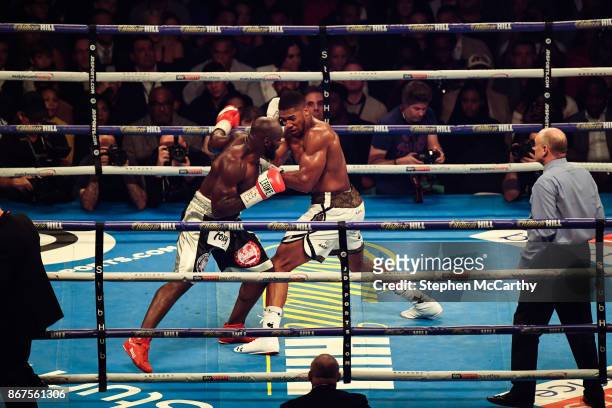 Cardiff , United Kingdom - 28 October 2017; Anthony Joshua, right, and Carlos Takam during their World Heavyweight Title fight at the Principality...