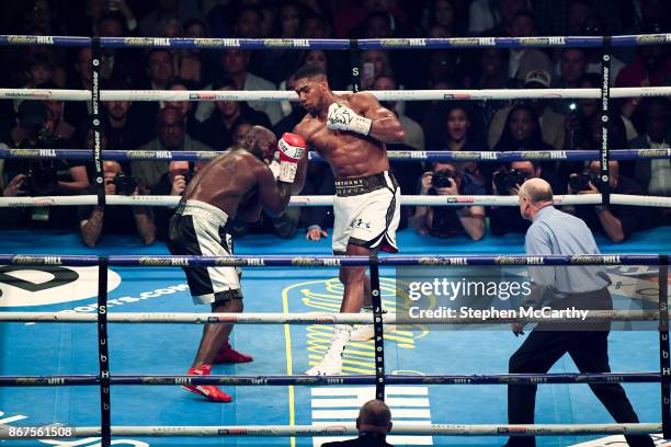 Cardiff , United Kingdom - 28 October 2017; Anthony Joshua, right, and Carlos Takam during their World Heavyweight Title fight at the Principality...