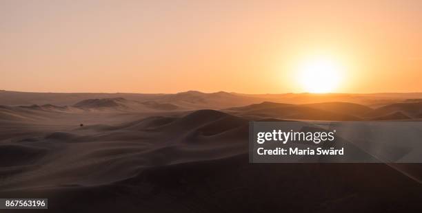 huacachina sunset, peru - nazca stock pictures, royalty-free photos & images