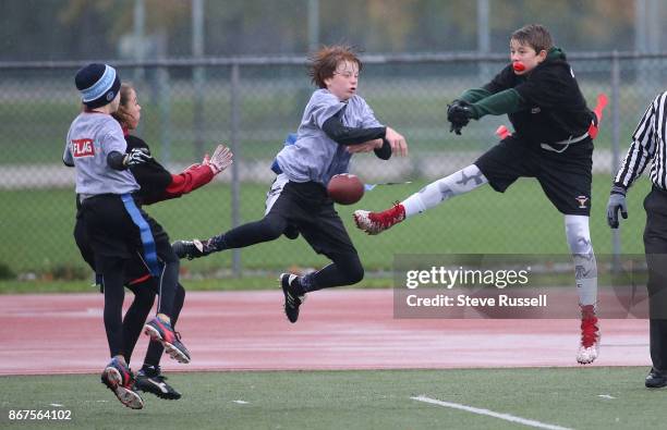 Pass is broken up in the end zone. The CFL-NFL are hosting a flag football regional tournament featuring co-ed teams of 10-11 year olds. Each CFL...