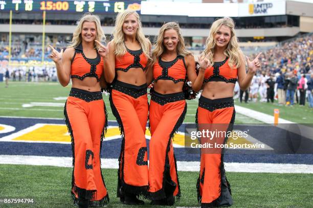 The Oklahoma State Pom Squad on the field during the second quarter of the college football game between the Oklahoma State Cowboys and the West...