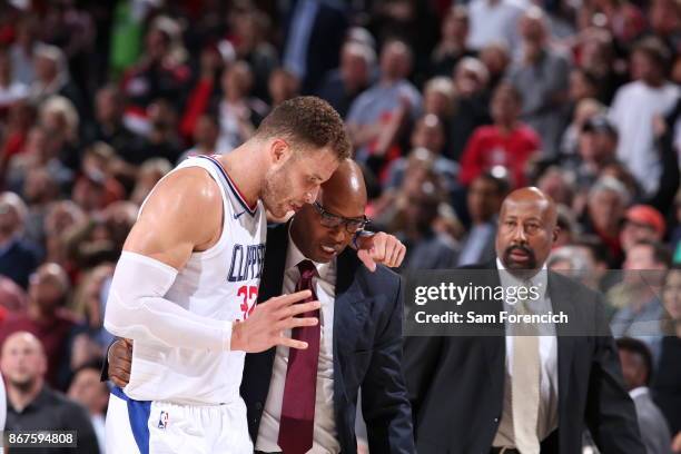 Blake Griffin and Assistant Coach Sam Cassell of the LA Clippers talk during the game against the Portland Trail Blazers on October 26, 2017 at the...