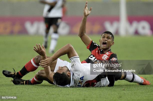 Marcio Araujo of Flamengo battles for the ball with Andres Rios of Vasco da Gama during the match between Flamengo and Vasco da Gama as part of...