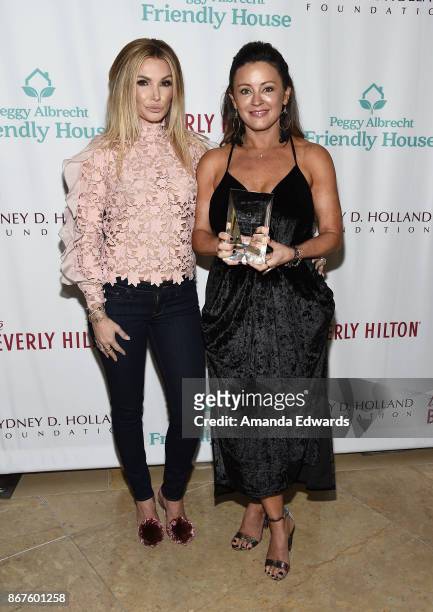 Television personality Eden Sassoon and actress Dru Mouser arrive at Peggy Albrecht Friendly House's 28th Annual Awards Luncheon at The Beverly...