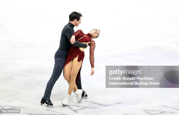 Tessa Virtue and Scott Moir of Canada perform in ice dance during the ISU Grand Prix of Figure Skating at Brandt Centre on October 28, 2017 in...