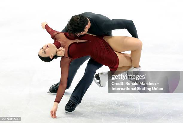 Tessa Virtue and Scott Moir of Canada perform in ice dance during the ISU Grand Prix of Figure Skating at Brandt Centre on October 28, 2017 in...