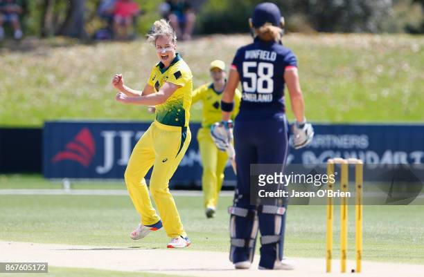 Australia's Ellyse Perry celebrates the wicket of England's Lauren Winfield during the Women's International One Day match between Australia and...