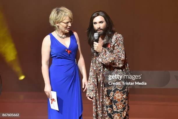 Andrea Ballschuh and Conchita Wurst attend the 12th Hope Charity Gala at Kulturpalast on October 28, 2017 in Dresden, Germany.