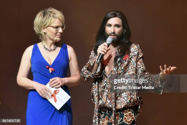 Andrea Ballschuh and Conchita Wurst attend the 12th Hope Charity Gala at Kulturpalast on October 28, 2017 in Dresden, Germany.