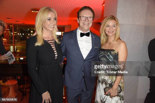 Wolfgang Lippert, his wife Gesine Lippert and Uta Bresan attend the 12th Hope Charity Gala at Kulturpalast on October 28, 2017 in Dresden, Germany.