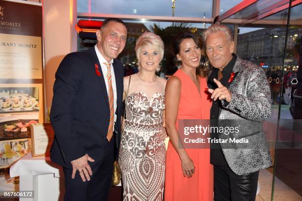 Linda Feller and her husband Andreas Schmid, Olaf Berger and his wife Julia Berger attend the 12th Hope Charity Gala at Kulturpalast on October 28,...