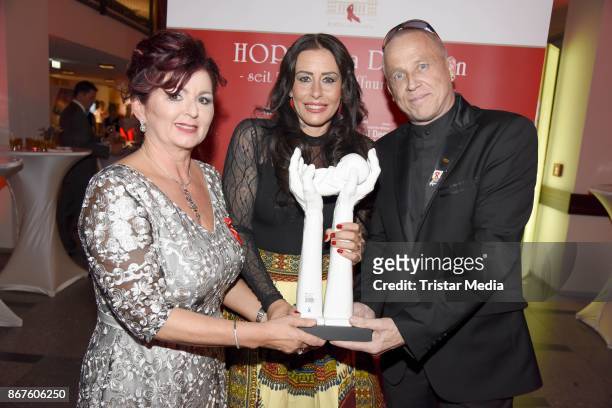 Viola Klein, Anja Ringgren Loven and Stefan Hippler attend the 12th Hope Charity Gala at Kulturpalast on October 28, 2017 in Dresden, Germany.