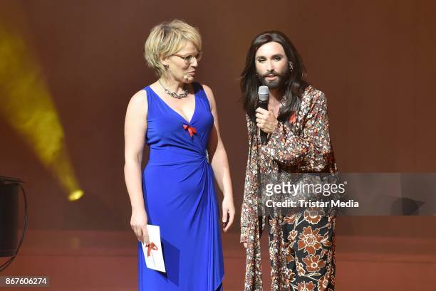 Andrea Ballschuh and Conchita Wurst attend the 12th Hope Charity Gala at Kulturpalast on October 28, 2017 in Dresden, Germany.