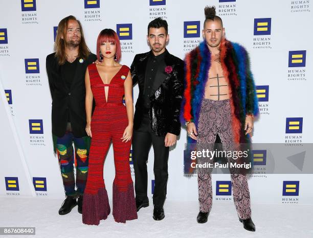 Musicians Jack Lawless, JinJoo Lee, Joe Jonas, and Cole Whittle of the band DNCE attend the 21st Annual HRC National Dinner at the Washington...