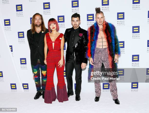 Musicians Jack Lawless, JinJoo Lee, Joe Jonas, and Cole Whittle of the band DNCE attend the 21st Annual HRC National Dinner at the Washington...