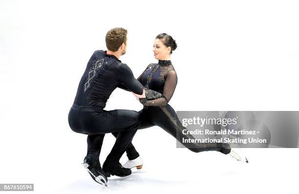 Haven Denney and Brandon Frazier of the United States practice pairs free skating during the ISU Grand Prix of Figure Skating at Brandt Centre on...