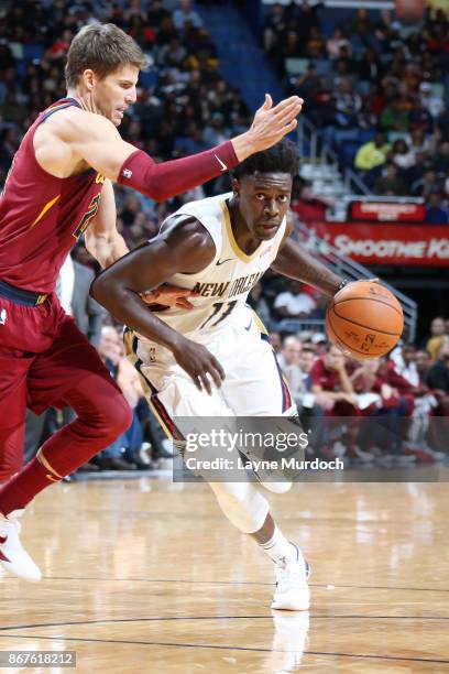 Jrue Holiday of the New Orleans Pelicans handles the ball against the Cleveland Cavaliers on October 28, 2017 at the Smoothie King Center in New...