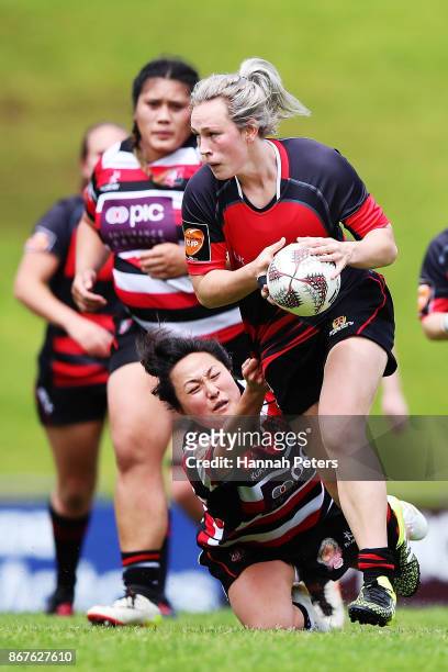 Olivia McGoverne of Canterbury charges forward during the Farah Palmer Cup Premiership Final match between Counties Manukau and Canterbury on October...