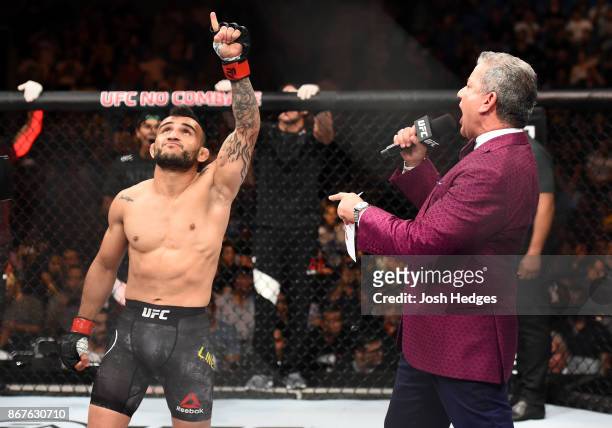John Lineker of Brazil is introduced by UFC Octagon announcer Bruce Buffer before facing Marlon Vera of Ecuador in their bantamweight bout during the...
