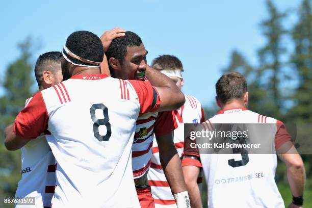 Isei Lewaqai of West Coast is congratulated by team mates after scoring a try during the Mitre 10 Heartland Championship Lochore Cup Final match...