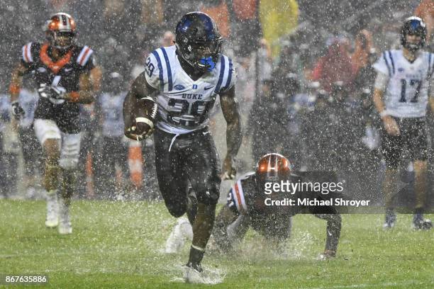Running back Shaun Wilson of the Duke Blue Devils carries the ball against the Virginia Tech Hokies in the second half at Lane Stadium on October 28,...