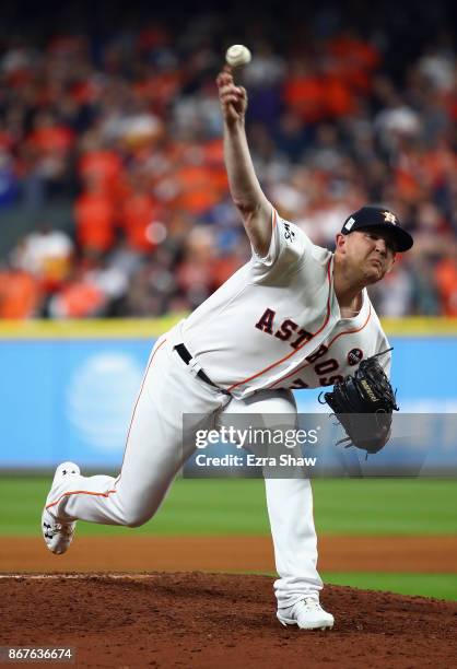 Will Harris of the Houston Astros throws a pitch during the seventh inning against the Los Angeles Dodgers in game four of the 2017 World Series at...