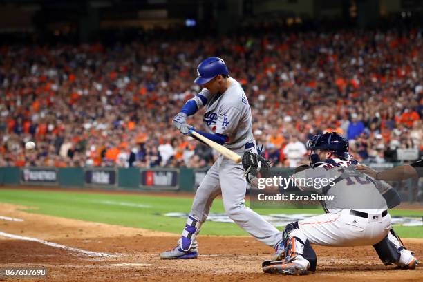 Cody Bellinger of the Los Angeles Dodgers hits a RBI double during the ninth inning against the Houston Astros in game four of the 2017 World Series...