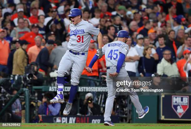 Joc Pederson of the Los Angeles Dodgers celebrates after hitting a three-run home run during the ninth inning against the Houston Astros in game four...