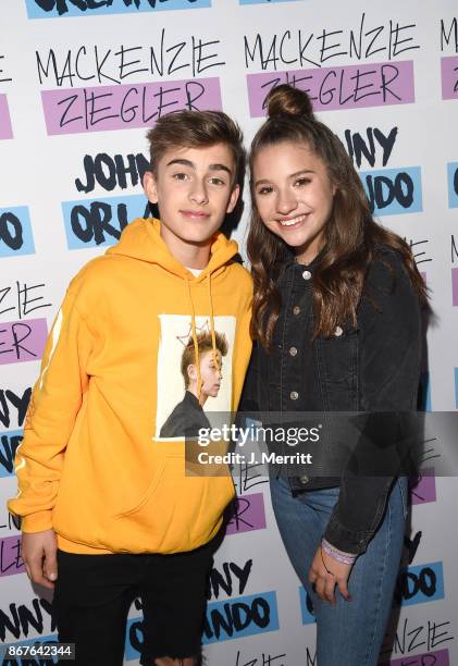 Johnny Orlando & Mackenzie Ziegler pose during a meet and greet on their "Day & NIght" tour at Mr Smalls on October 28, 2017 in Millvale,...