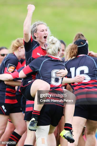 Olivia McGoverne of Canterbury celebrates after winning the Farah Palmer Cup Premiership Final match between Counties Manukau and Canterbury on...