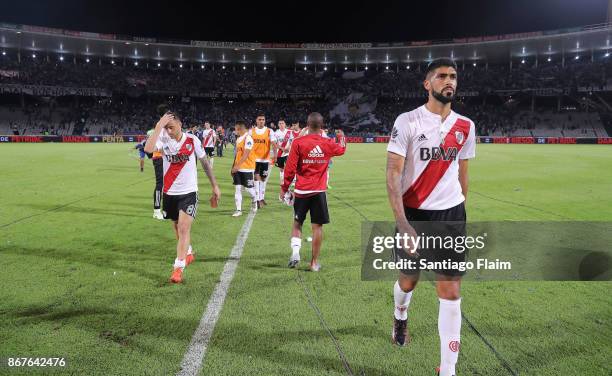 Players of River Plate look dejected after a match between Talleres and River Plate as part of Superliga 2017/18 at Mario Alberto Kempes Stadium on...