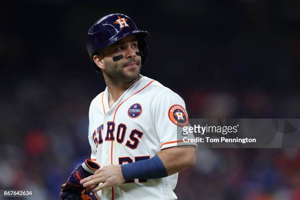Jose Altuve of the Houston Astros reacts after flying out to end the game against the Los Angeles Dodgers in game four of the 2017 World Series at...