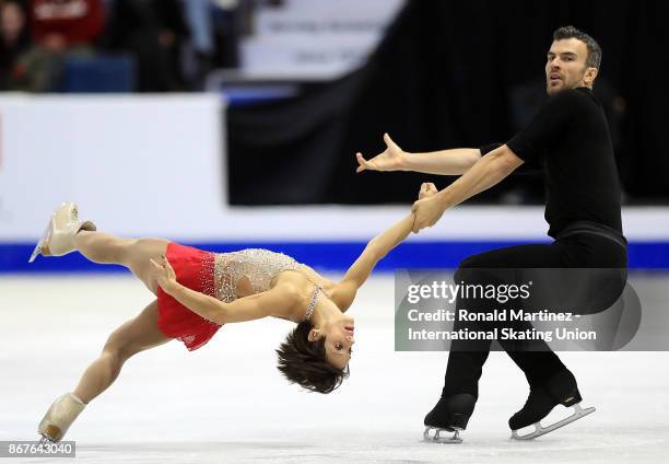 Meagan Duhamel and Eric Radford of Canada perform in pairs free skating during the ISU Grand Prix of Figure Skating at Brandt Centre on October 28,...