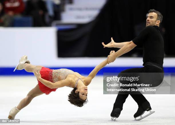 Meagan Duhamel and Eric Radford of Canada perform in pairs free skating during the ISU Grand Prix of Figure Skating at Brandt Centre on October 28,...