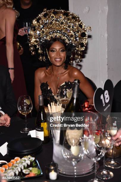 Naomi Campbell attends Moet Hennessy at The 2017 amfAR and The Naked Heart Foundation Fabulous Fund Fair on October 28, 2017 in New York City.