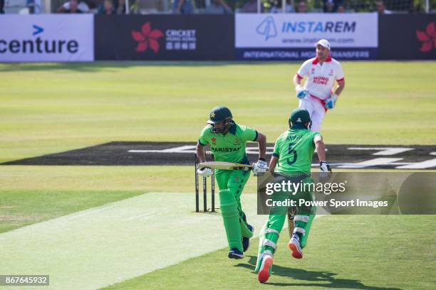 Captain Sohail Tanvir and Anwar Ali of Pakistan run between the wickets during Day 1 of Hong Kong Cricket World Sixes 2017 Group A match between...