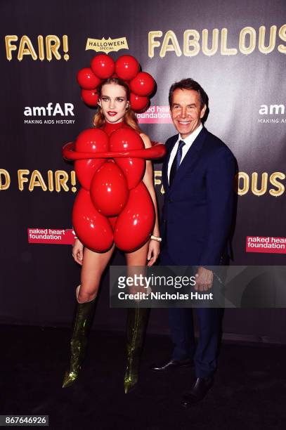 Natalia Vodianova and Jeff Koons attend the 2017 amfAR & The Naked Heart Foundation Fabulous Fund Fair at Skylight Clarkson Sq on October 28, 2017 in...