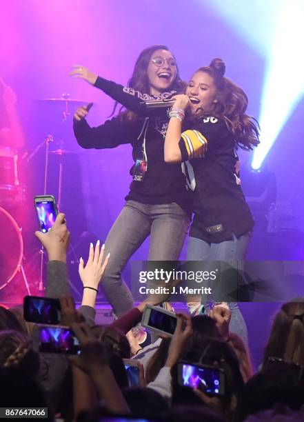 Maddie Ziegler celebrates on stage with Johnny Orlando & Mackenzie Ziegler during their "Day & NIght" tour at Mr Smalls on October 28, 2017 in...