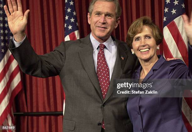 President George W. Bush waves as he stands next to Congresswoman Connie Morella at a hotel June 28, 2002 in Washington, DC. President Bush spoke at...