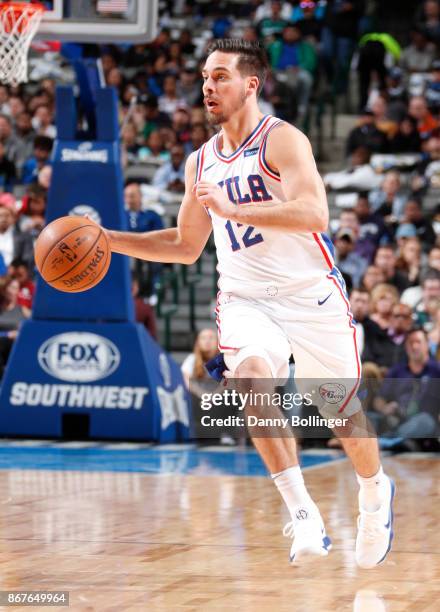 McConnell of the Philadelphia 76ers handles the ball against the Dallas Mavericks on October 28, 2017 at the American Airlines Center in Dallas,...