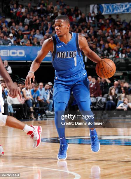 Dennis Smith Jr. #1 of the Dallas Mavericks handles the ball against the Philadelphia 76ers on October 28, 2017 at the American Airlines Center in...