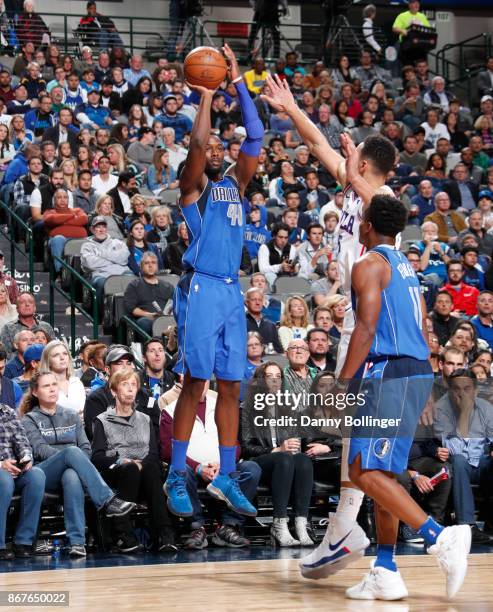 Harrison Barnes of the Dallas Mavericks shoots the ball against the Philadelphia 76ers on October 28, 2017 at the American Airlines Center in Dallas,...