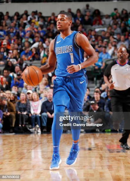 Dennis Smith Jr. #1 of the Dallas Mavericks handles the ball against the Philadelphia 76ers on October 28, 2017 at the American Airlines Center in...