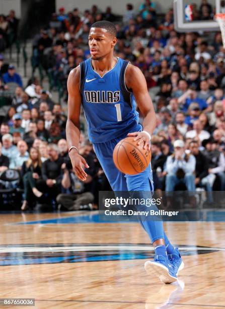 Dennis Smith Jr. #1 of the Dallas Mavericks handles the ball against the Philadelphia 76ers on October 28, 2017 at the American Airlines Center in...