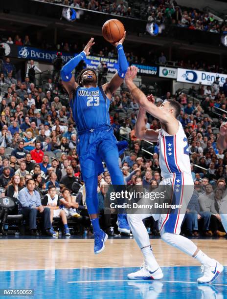 Wesley Matthews of the Dallas Mavericks shoots the ball against the Philadelphia 76ers on October 28, 2017 at the American Airlines Center in Dallas,...