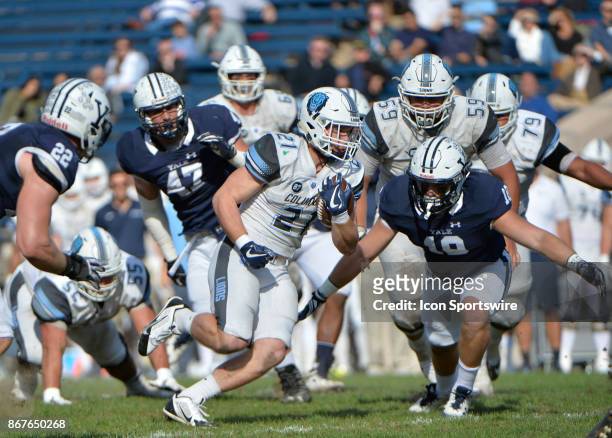 Columbia Lions running back Chris Schroer squeezes thru the defensive line during the game between the Yale Bulldogs and the Columbia Lions on...