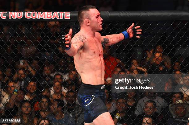 Colby Covington celebrates after defeating Demian Maia of Brazil in their welterweight bout during the UFC Fight Night event inside the Ibirapuera...