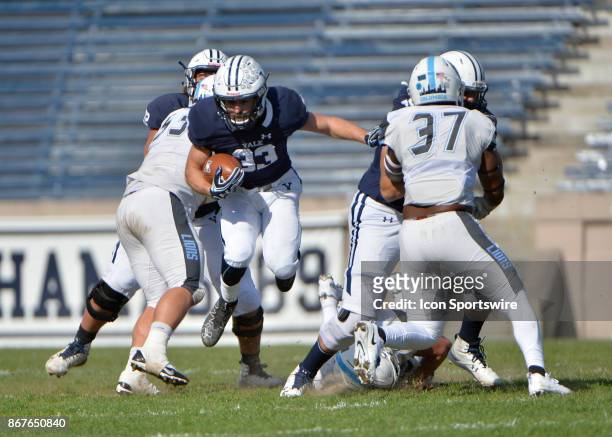 Yale Bulldogs running back Zane Dudek finds a break in the offensive line to rush thru during the game between the Yale Bulldogs and the Columbia...