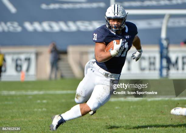 Yale Bulldogs running back Deshawn Salter runs the ball up the field during the game between the Yale Bulldogs and the Columbia Lions on October 28,...
