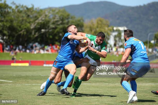 Api Pewhairangi of Ireland is tackled during the 2017 Rugby League World Cup match between Ireland and Italy at Barlow Park on October 29, 2017 in...